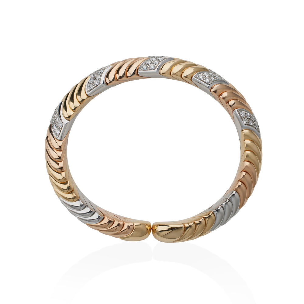 
                      
                        Macklowe Gallery Bulgari Tri-color Gold and Diamond "Spiga" Bangle Bracelet
                      
                    